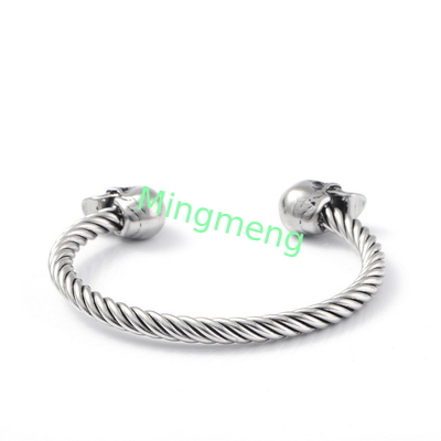 Bracelet explosif pour homme à double crâne en acier inoxydable.