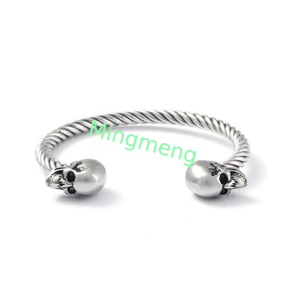 Bracelet explosif pour homme à double crâne en acier inoxydable.