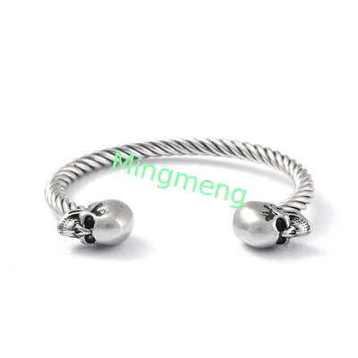 Bracelet explosif pour homme à double crâne en acier inoxydable.